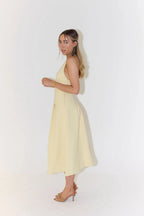 The Ultimate Muse Dropped Hem Midi Dress in Lemon